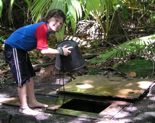 Abby from Estrela collects non-potable water at the well in Chagos