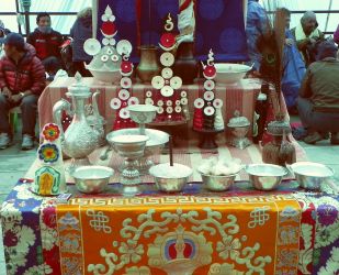 Torma ball offerings in front of the monks