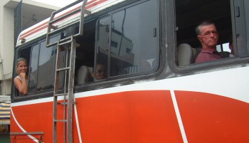 Amanda (back) and Kim (from Vamp, front) on an Ecuadorian bus