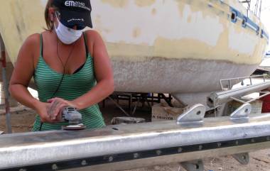 Amanda working up near the top of the mast (& under shade)