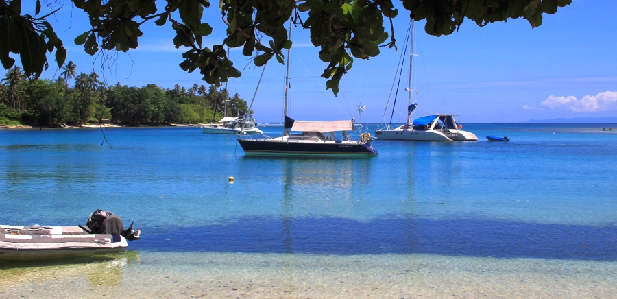 Our fleet anchored off tranquil Nuhu Village