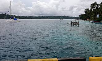 Ocelot and Soggy Paws anchored off Mansinam