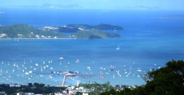 Ao Chalong, Phuket, Thailand, with Phi Phi Don visible 25 miles away (upper right)