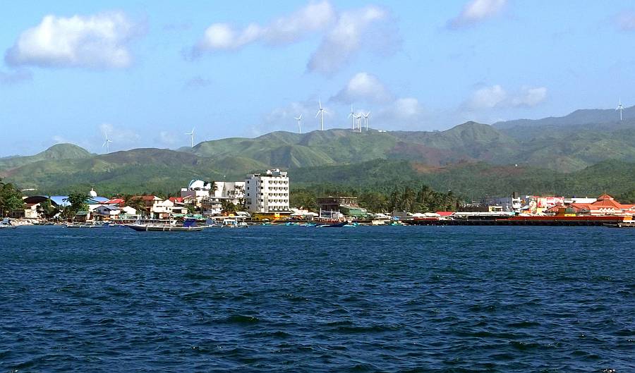 Approaching Caticlan from the north. Note the wind farm on the hill above town.