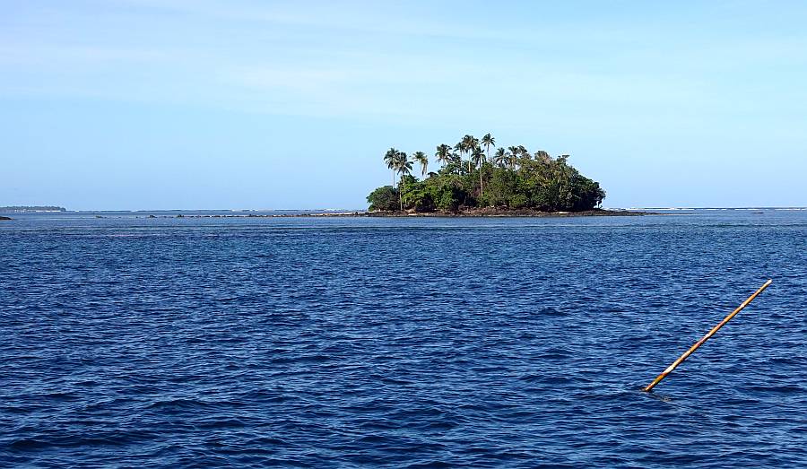 Only reef and this island protect the bay