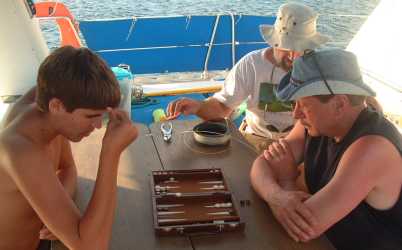 Terry teaching Chris how to lose while Jon puts together another fishing rig