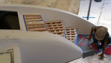 Preparing the starboard sugar-scoop steps for nonskid