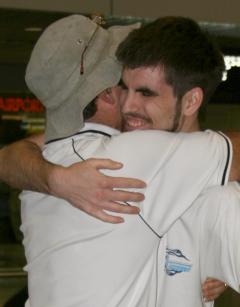 Bear hugs for Chris at the KL airport