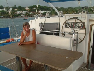 Sue in the cockpit with the seat folded down & the table open