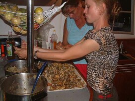 Sue and Natasha (Sea Eagle) hard at work shelling crab pieces