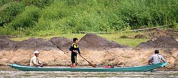 Local fishing boats were common on the Mekong