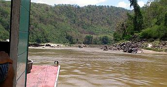 Following another long-boat through some rapids