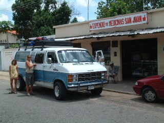 Amanda and Kat next to our van at a snack stop in Los Llanos