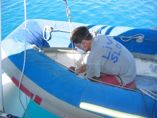 Jon doing prep-work so Sue can paint Tomcat