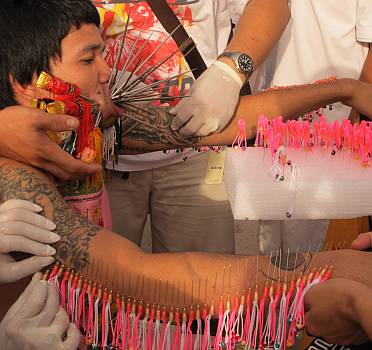 Extreme cases add decorated needles along their arms