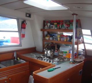 Our galley, showing the custom shelves built in Venezuela.