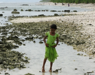 Young girl on the beach, Hithadhoo, Addu Atoll, Maldives