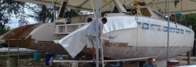 Ocelot, with her starboard wall getting a layer of biaxial glass