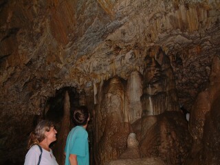 Sue & Chris examining limestone formations in the caves