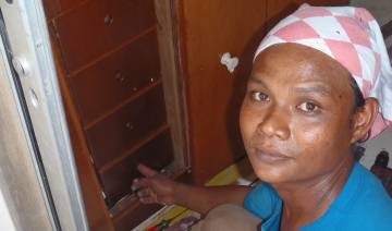 Houa, our carpenter, showing off the drawers he fitted