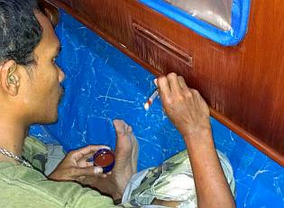 Baw coloring the water-damaged aft cabin teak