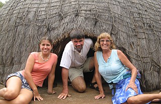 We try out a Swazi hut, but it's a bit small!