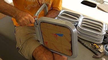 Jon assembling the friction hinges of the 10 small deck hatches