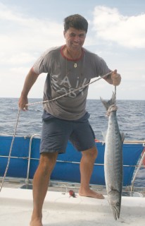 Jon lands a big barracuda in the Indian Ocean