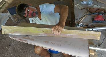 Jon checking the rudder shape (see the pencil in his hand?)