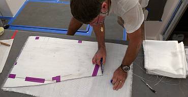 Using a template to cut out 200g glass cloth for the rudder