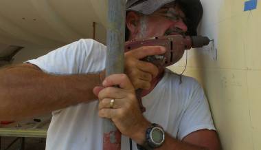 Jon trying to drill through the 9mm stainless steel backing plate