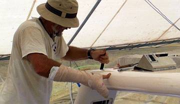 Starboard shoulder piece, with Jon filing open a rope hole