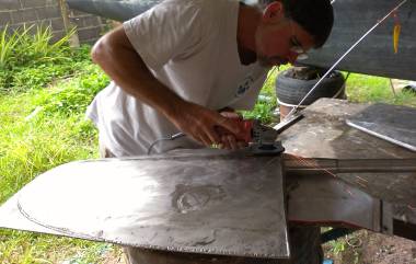 Jon turning high-grade stainless steel into low-grade dust