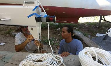 Jon and Heru working on a jammed pull-through string