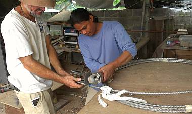 Cutting a big stainless swaged stud off our old headstay