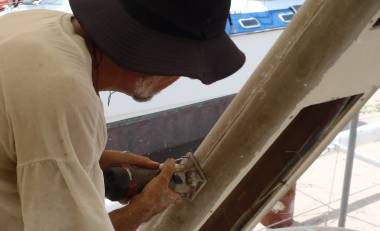 Jon routing the gelcoat out of the joint line of the Targa bar