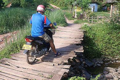 A slightly less rickety bridge built to take scooters
