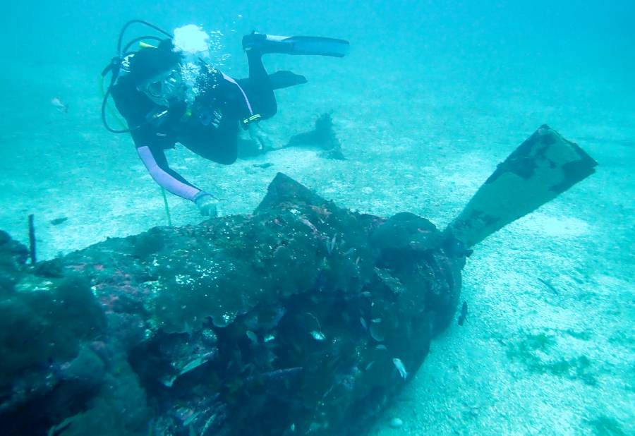 Jon checks out the nose of a P39 wreck