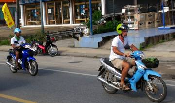 Jon on our cute little scooter, looking for stainless bits