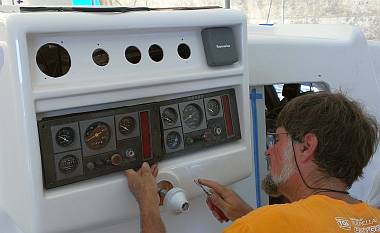 Jon fixing his gaskets behind the 2 engine instrument panels