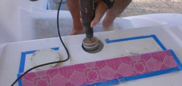 Jon enlarging the hole above the emergency rudder bearing