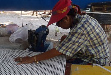 Ju sewing our heavy trampoline material for us