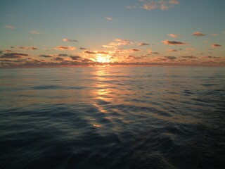 The sun greets another day on the vast Pacific Ocean