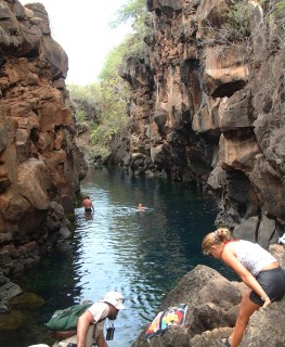 Tony and Amanda prepare to climb down into the clear waters of Las Grietas