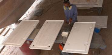 Lek painting the undersides of the 4 big cockpit lockers