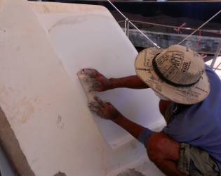 Lek sanding to right of companionway (was bare)