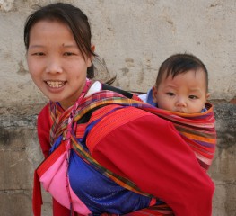 A Lisu Hilltribe girl and baby