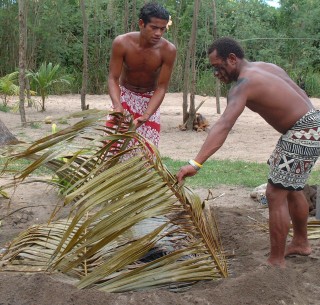 Uncovering the Lovo (ground oven) feast