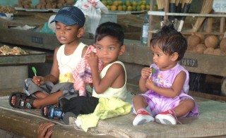 Indo-Fijian children at the market in Suva