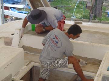 Jon & Max glassing the first piece of foam, port side